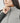 Stormtech_Womens Cascadia Thermal Vest_TVX-1W_FM_Detail_StormGrey_01_2025